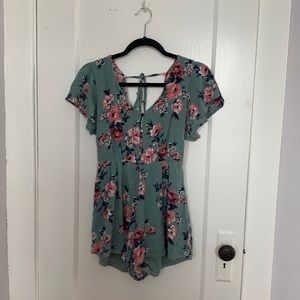 Short sleeved blue and pink floral romper
